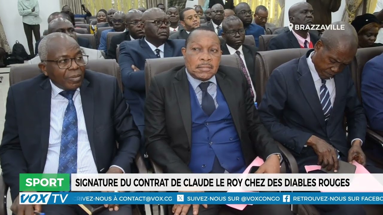 Signature du contrat de Claude le Roy chez des Diables Rouges