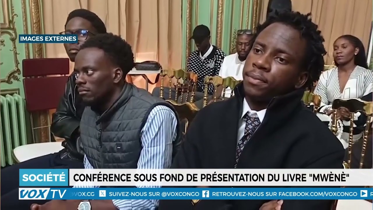 Conférence sous fond de présentation du livre